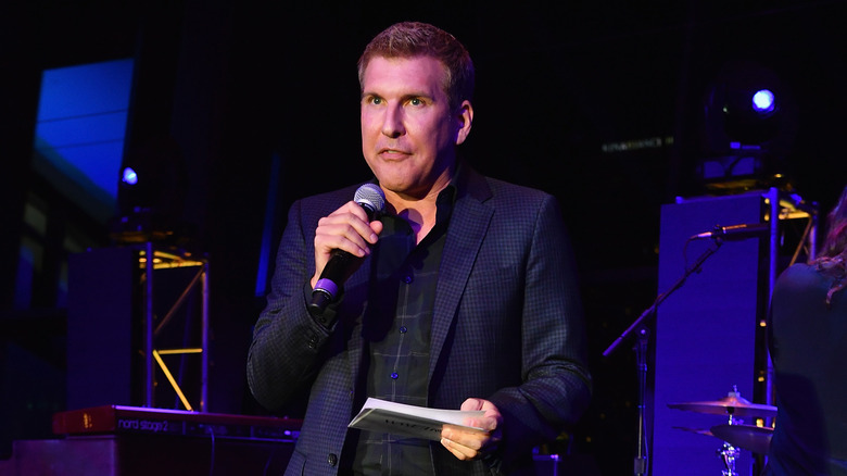 Todd Chrisley with microphone