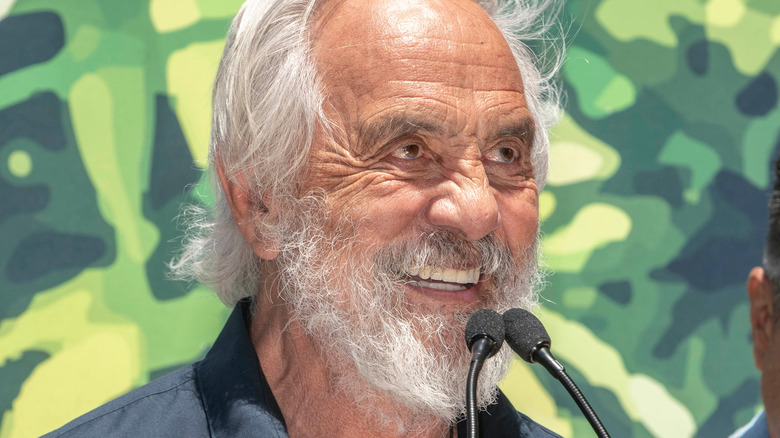 Chong at a microphone