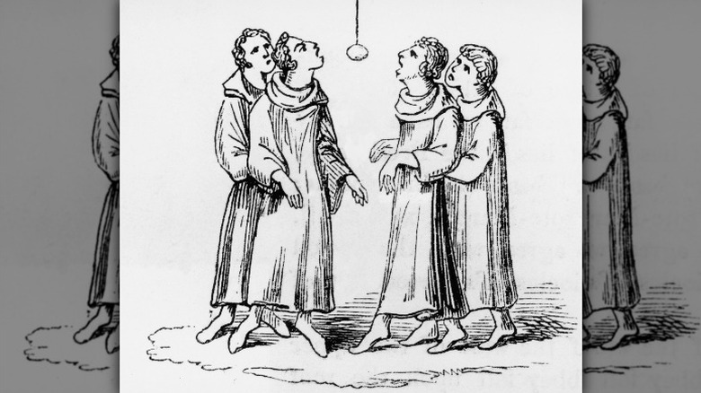 Monks play a Halloween game