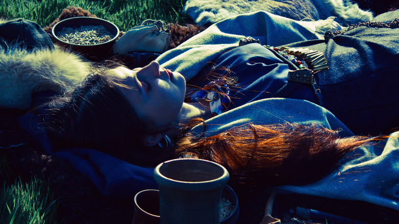 Model poses as Viking dead with grave goods