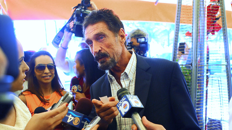 John McAfee speaking to press