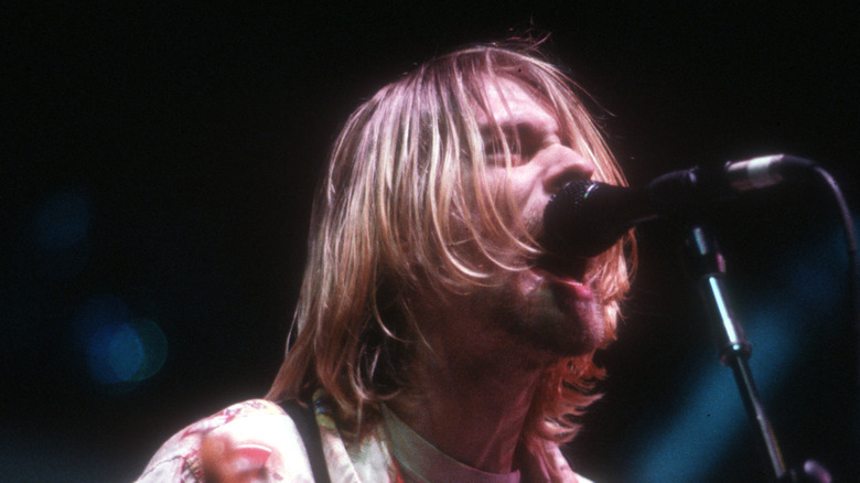 Kurt Cobain singing into microphone