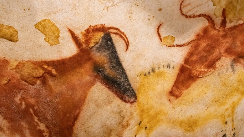 Cave painting, two mammals face-to-face