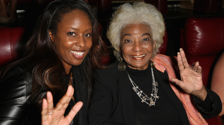 Angelique Fawcette and Nichelle Nichols giving the Vulcan salute