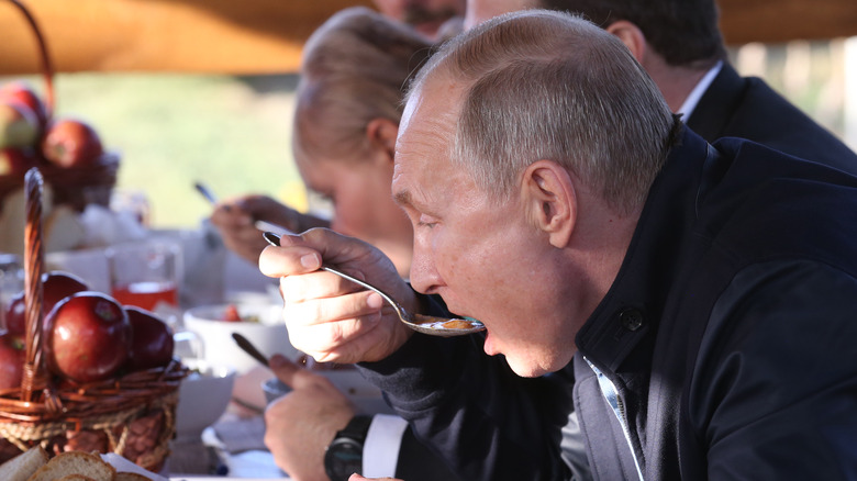 Putin eating