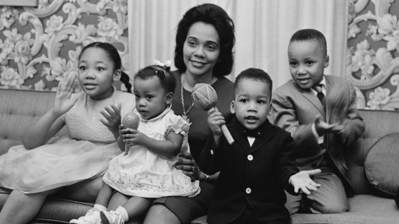 Young King family sat on sofa