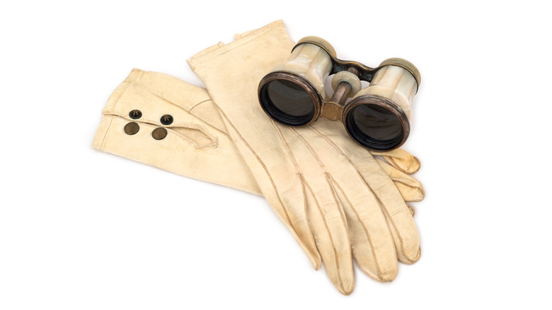 white leather gloves with opera glasses