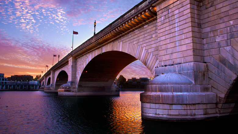 Sun sets behind London Bridge