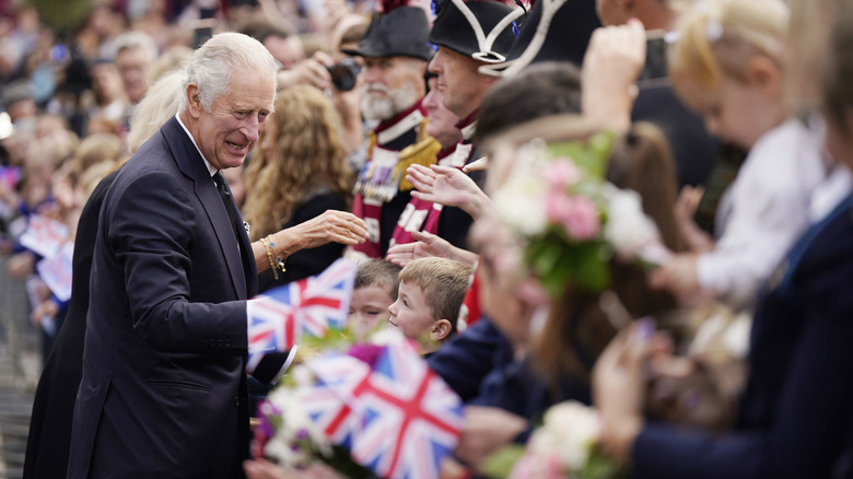 King Charles III greeting crowd