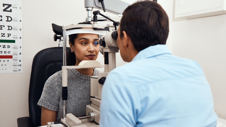 person getting eyes examined