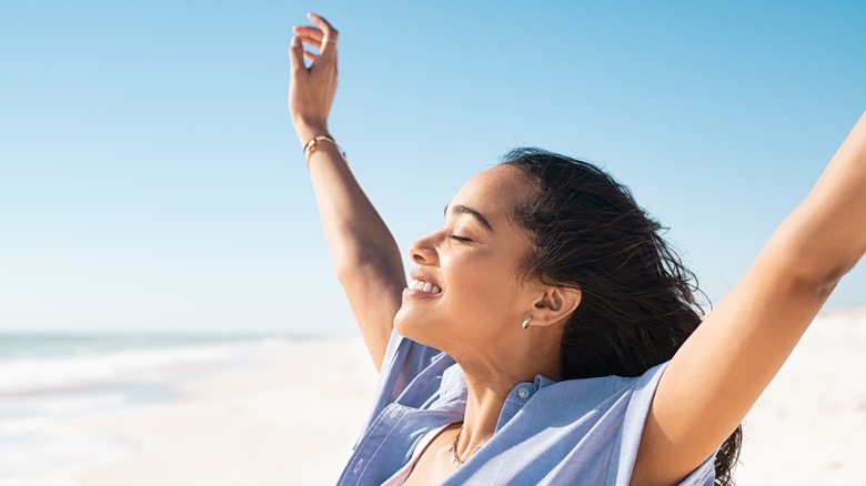 woman smiling on the beach