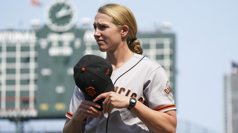 Alyssa Nakken holds her cap