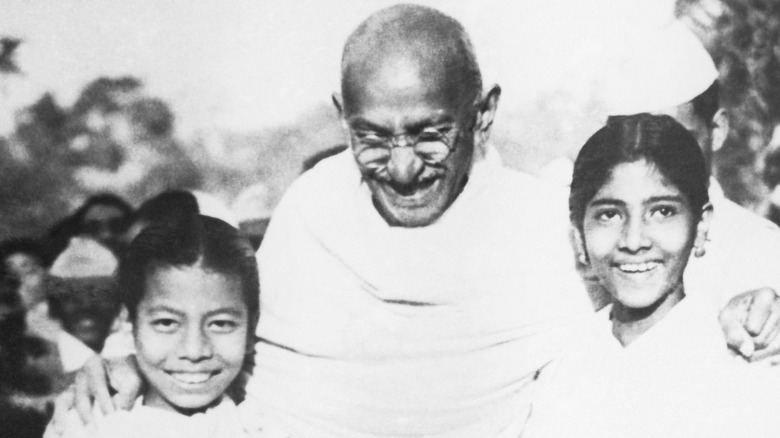 Mahatma Gandhi with two girls