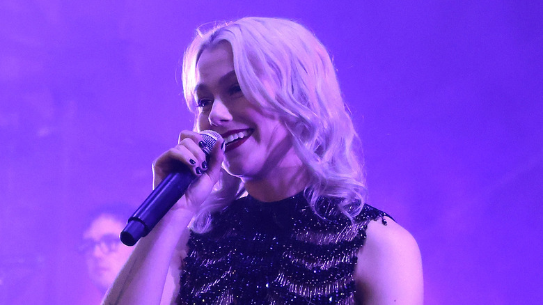 Phoebe Bridgers with a mic