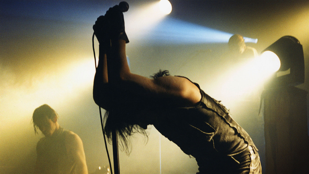 Nine Inch Nails performs on stage in 1994