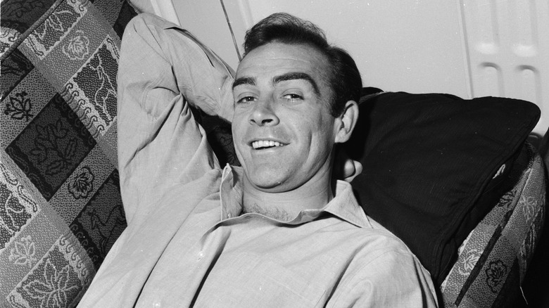 Sean Connery lying on the couch