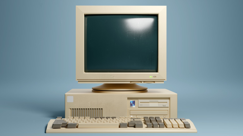 Old beige computer tower and monitor