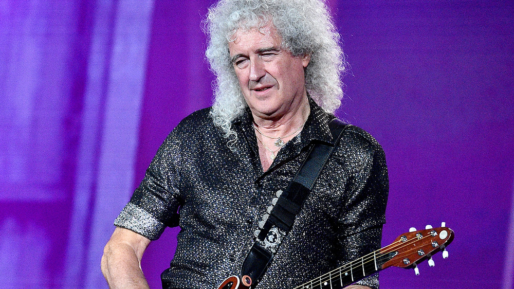 Brian May playing guitar