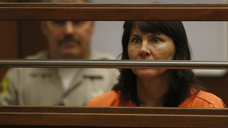 Stephanie Lazarus in court in orange jumpsuit