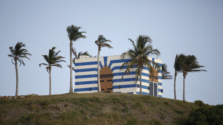 island temple blue white palm trees