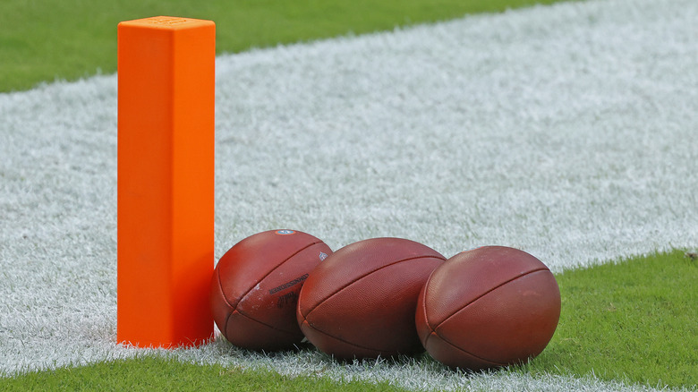 footballs on a football field