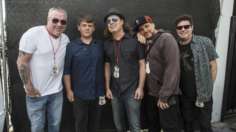 Smash Mouth posing backstage for photo