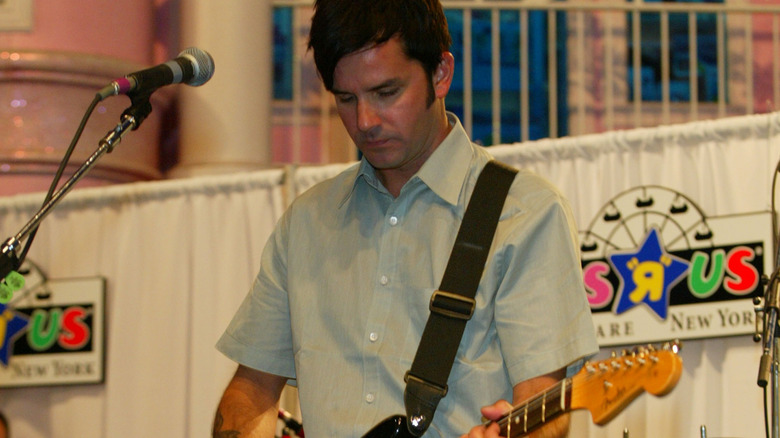 Greg Camp playing guitar