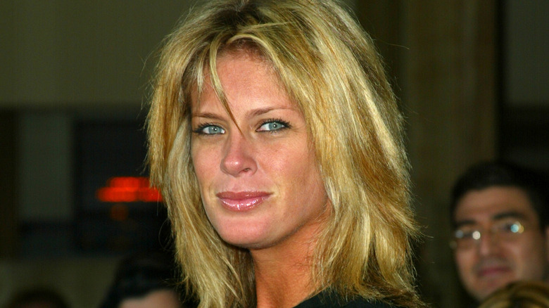 Rachel Hunter smiling with feathered hair