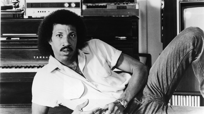 Lionel Ritchie in front of music equipment