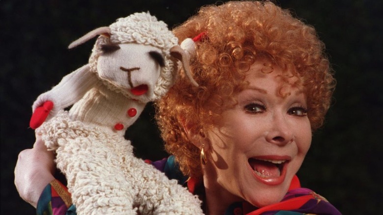 Shari Lewis and Lamb Chop smiling