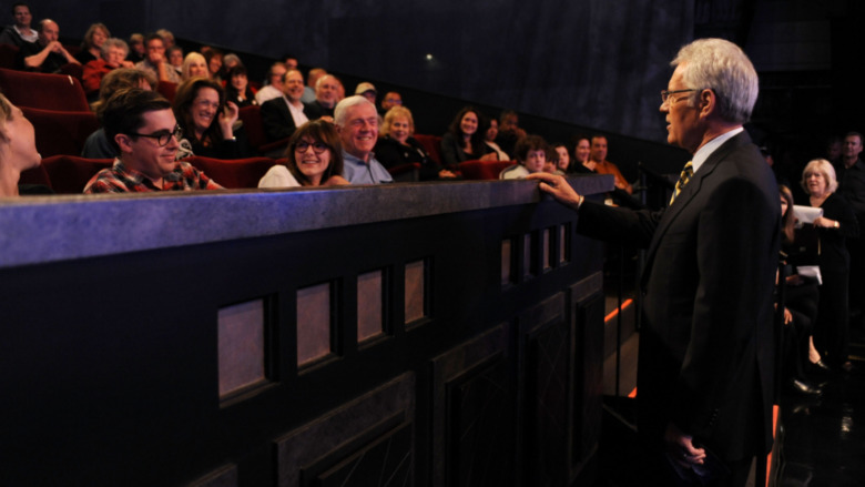 Alex Trebek talking with Jeopardy! audience members