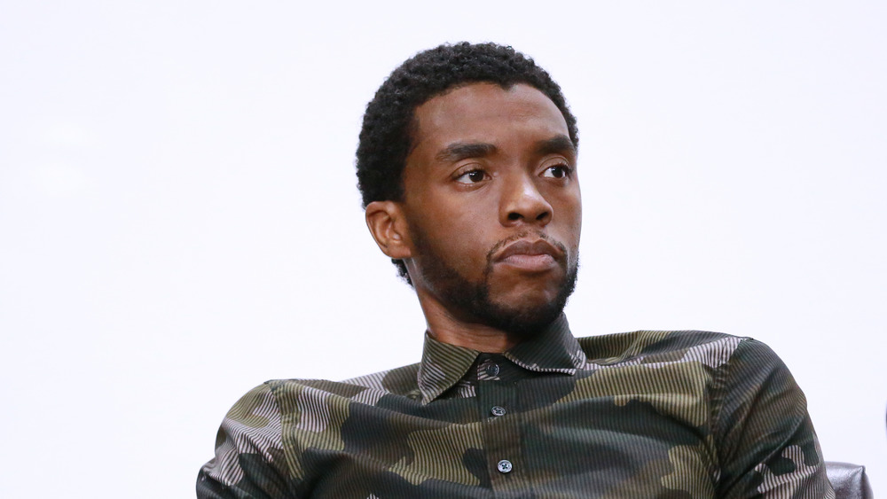 Chadwick Boseman wearing camouflage shirt