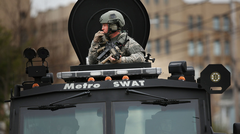 SWAT member in armored vehicle