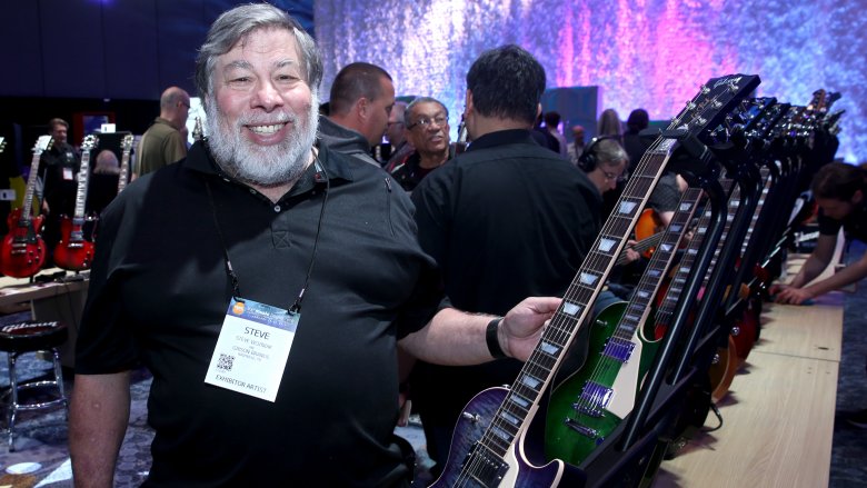 Steve Wozniak smiling beard by guitar