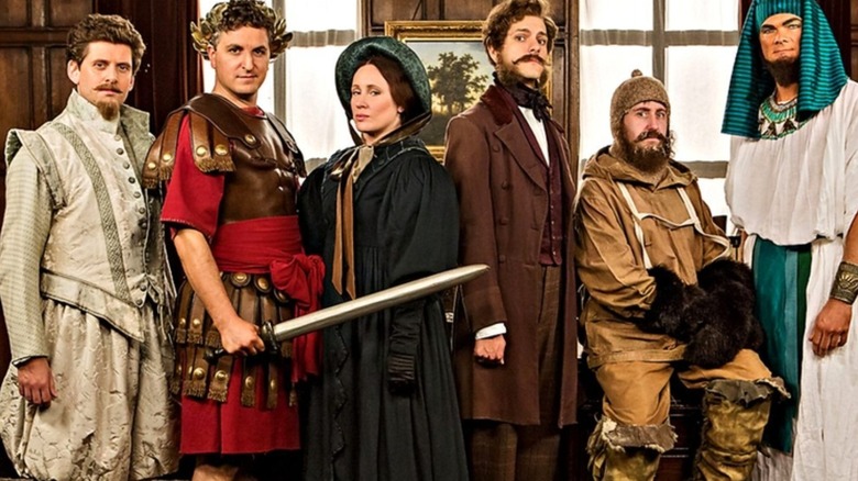 Cast of Horrible histories in various costumes