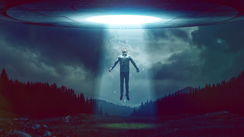 Alien abductee sucked into flying saucer