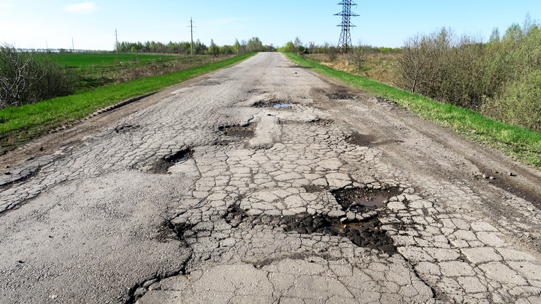 pothole filled road