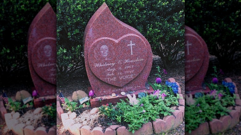 Whitney Houston's grave with flowers