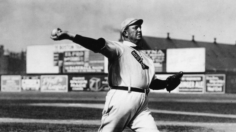 Cy Young throwing baseball