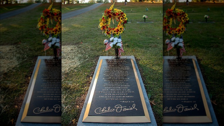 Charlie Daniels' gravesite with flowers