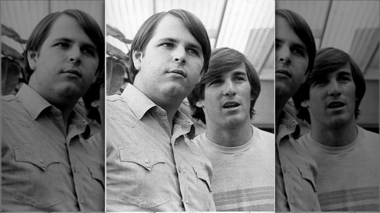 Carl Wilson and Dennis Wilson pose for photo