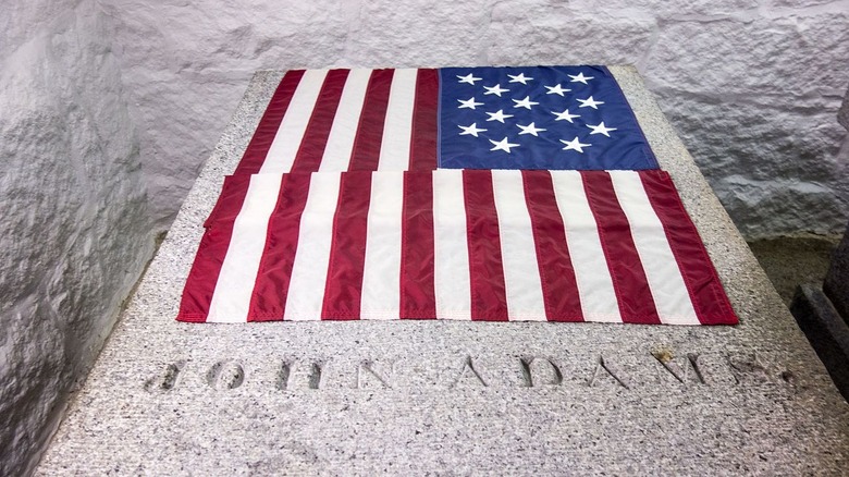 John Adam's tomb draped in an old American flag