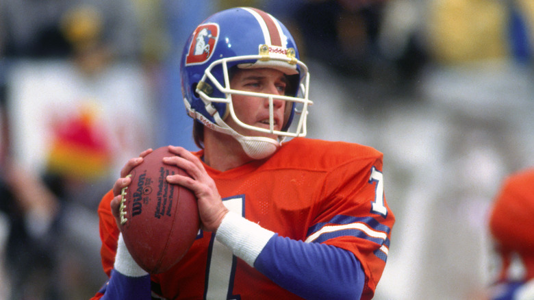 John Elway throwing a pass