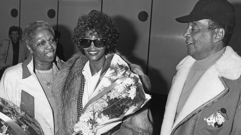 Cissy, Whitney, and John Houston smiling