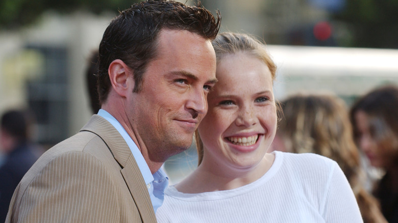 Matthew Perry and sister smiling