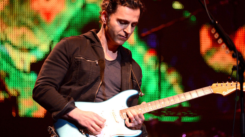 Dweezil Zappa performing in concert