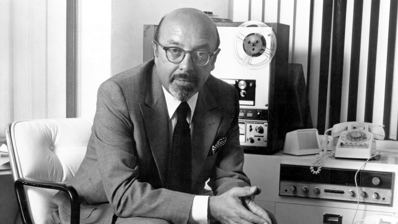 Ahmet Ertegun sitting in chair