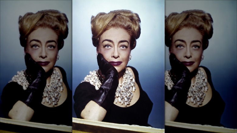 Joan Crawford posing in jewels