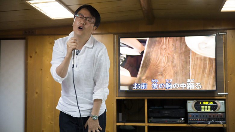 Japanese man doing karaoke