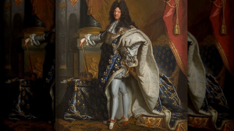 King Louis XIV displays his shoes